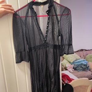 free people sheer black dress. lace and silver buttons